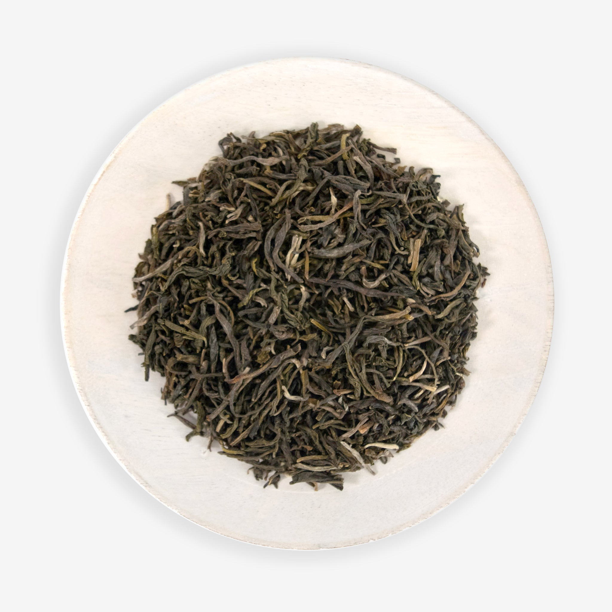 A plate of dried green tea leaves.