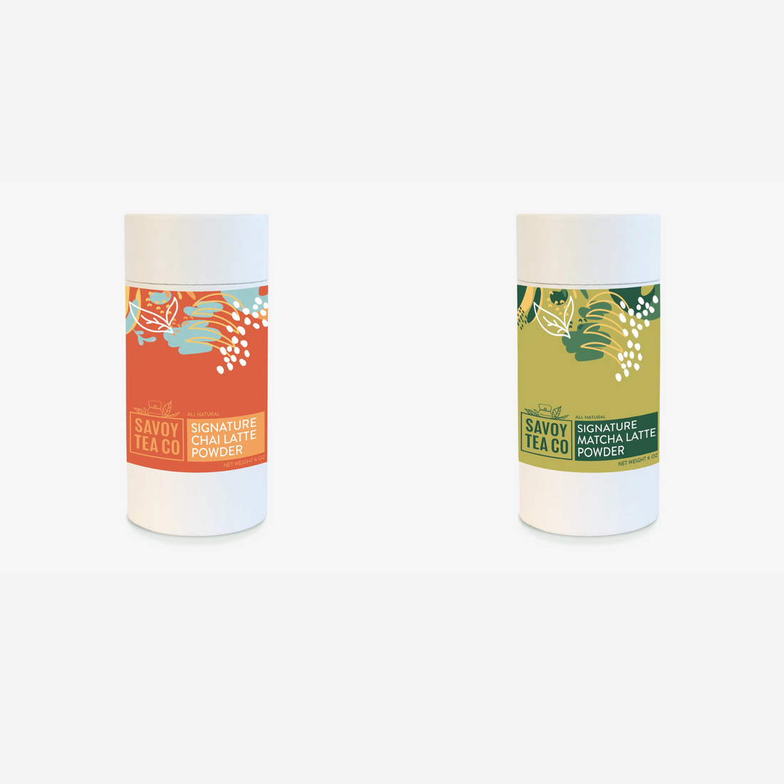 Two containers of Savoy latte powders, one labeled as Chai Latte Powder with orange and red tones, and the other as Matcha Latte Powder with green and white tones.